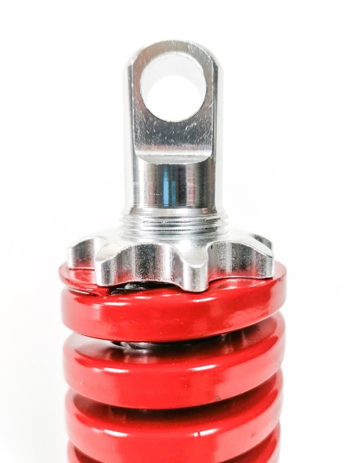Czerwony tylny amortyzator centralny do hulajnogi elektrycznej Ecorider widok detal