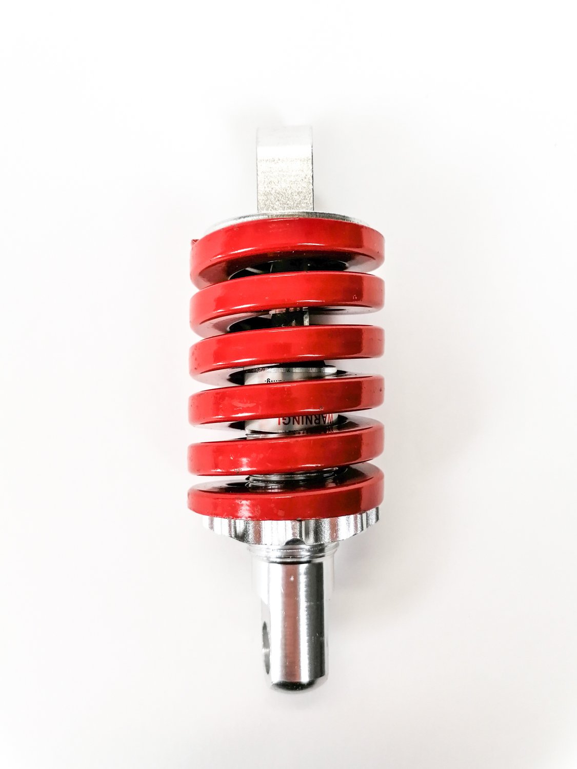 Czerwony tylny amortyzator centralny do hulajnogi elektrycznej Shift Seven T8 widok bok